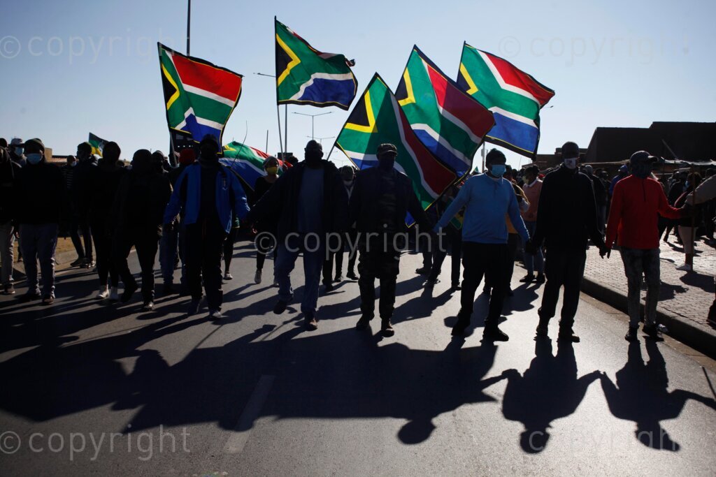 The community of Diepkloof in Soweto embarked on an operation dudula during the Youth Day holiday to warn the illegal foreign nationals living in Soweto, south west of Johannesburg in Gauteng, South Africa to vacate the premises and visited houses that are alleged to be selling drugs. The peaceful confrontations took place with the involvement of police that were overseeing the entire process.  16/06/21 Photo: Oupa Nkosi