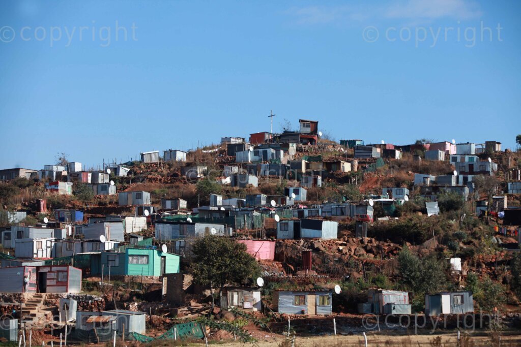 A view of the Devland informal settlement near Naturena, south of Johannesburg, Gauteng in South Africa. Despite the high unemployment and poverty, some of the houses have satellite dishes that allow them to view local and international content on television. 29 June 2023 Photo: Oupa Nkosi