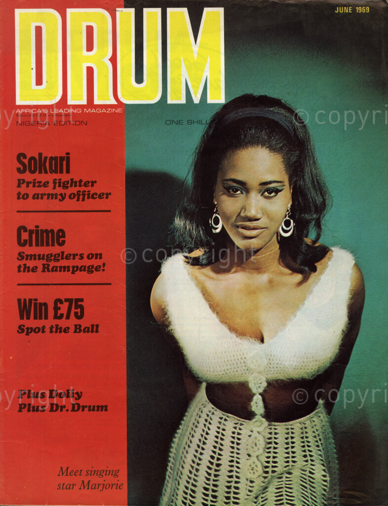 Sokari: Prize fighter to army officer; Verso: Cover girl Majorie Mishelle, from Jamaica now in Britain. Actress, model, soul singer and fun girl. She is the only girl in the seven-strong soul formation known as the Official Receivers. She became lead singer with the Official Receivers toward the end of last year, after a three year spell of singing around the clubs with the other groups.
