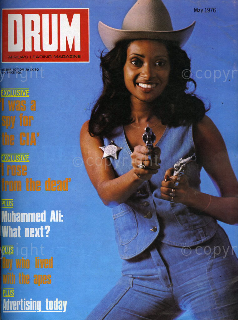 I was a spy for the CIA' ; 'I rose from the dead'; Verso: Cover girl is Debbie, with toy guns.