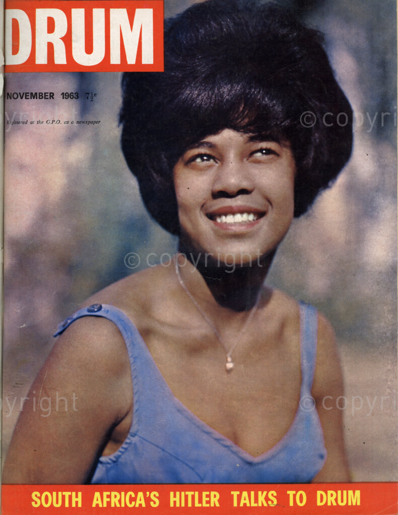 South Africa's Hitler Talks to Drum; Verso: Cover girl – World's shyest cover girl and most refreshing cover girl is Olga Phillis. Her hobbies are music and netball.