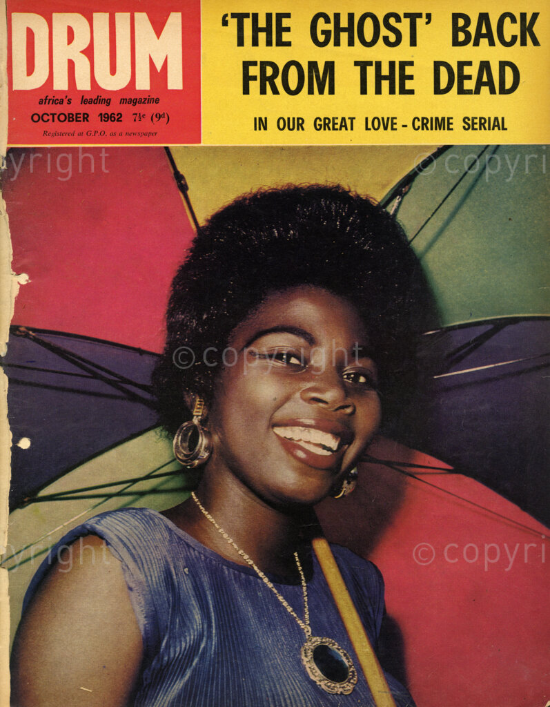 The Ghost' Back from the Dead; Verso: Cover girl, she is a Nigerian lovely, name of Yeside Cole.
