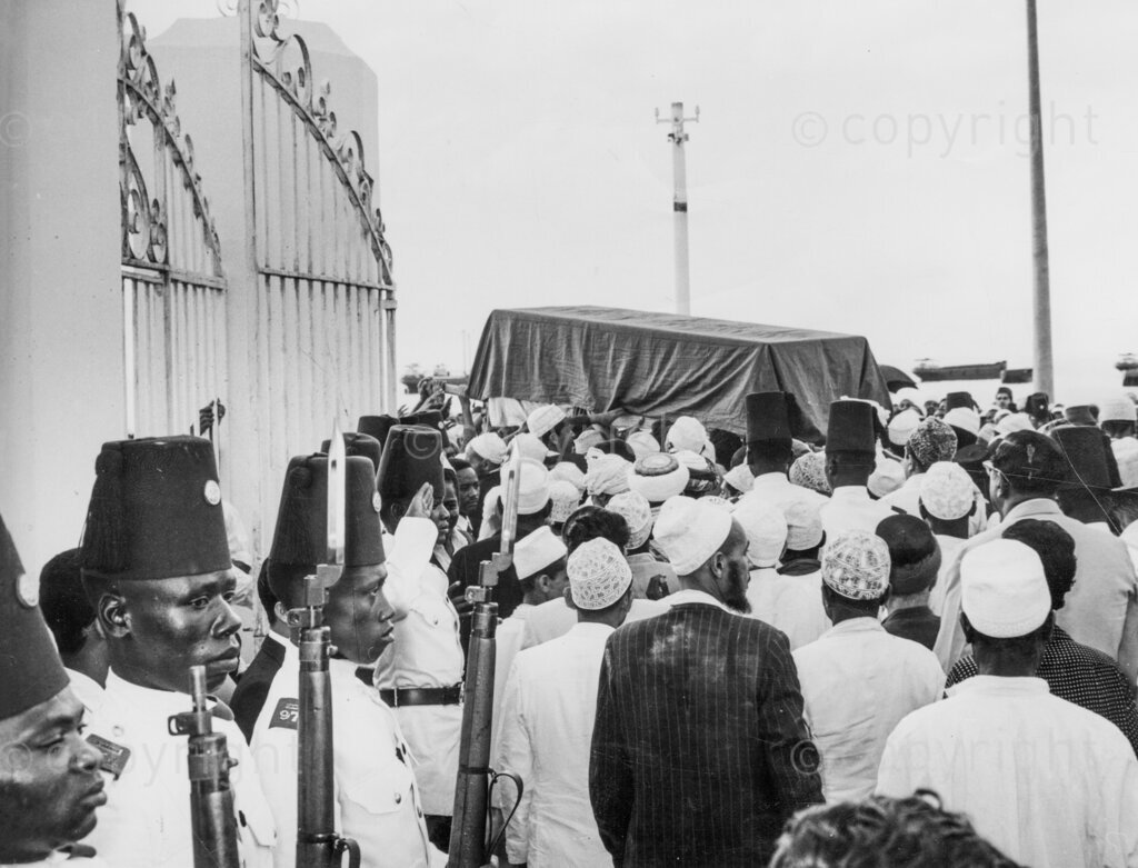 The coffin of the Sultan of Zanzibar, who died on Sunday, is borne by his son, grandsons and relatives from the palace to the mosque. The procession then returned to the palace where the Sultan was buried in the grounds.