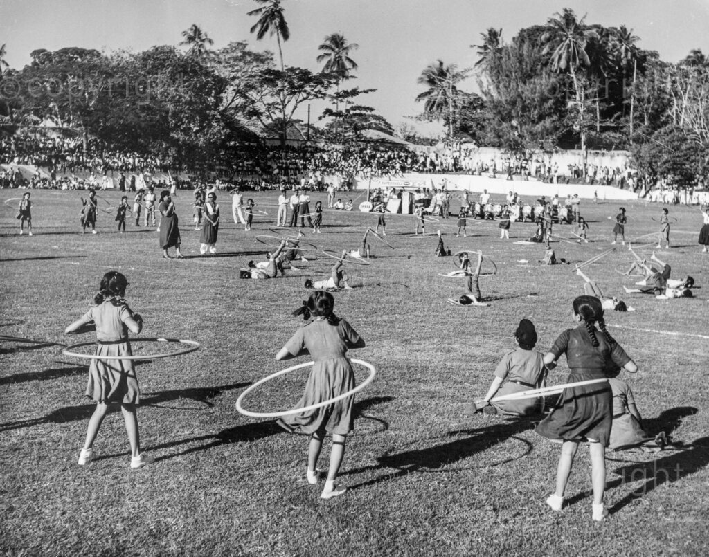 Everybody is getting into the swing as members of young people's organisations in Zanzibar demonstrate various ways of using the hula hoop. They were giving demonstration at the Sayyid Khalifa Stadium during the celebrations for the Sultan's 80th birthday.
