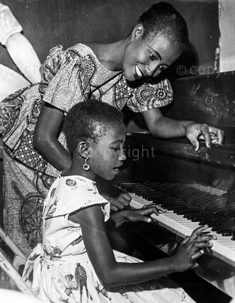 Julie Okine with her daughter playing Organ – Like Mama, even in music it looks like it's still