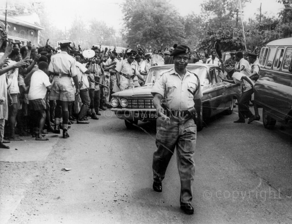 Despite the fear and the threats, Okpara triumphs In No-Man's Land. Police had little to do but clear way through happy crowds. Dr Michael Okpara's meet-the-people-tour of Western Nigeria, apart from proving a bizarre mixture of incivility, escapism, hefty defence against non-existent troubles and a field day for journalistic zanies and radio cranks, was a glorious personal triumph for Dr Okpara's bravery and a confirmation that the people of Western Nigeria have not forgotten Chief Abafemi Awolowo and can still welcome any leader who comes along as his friend.
