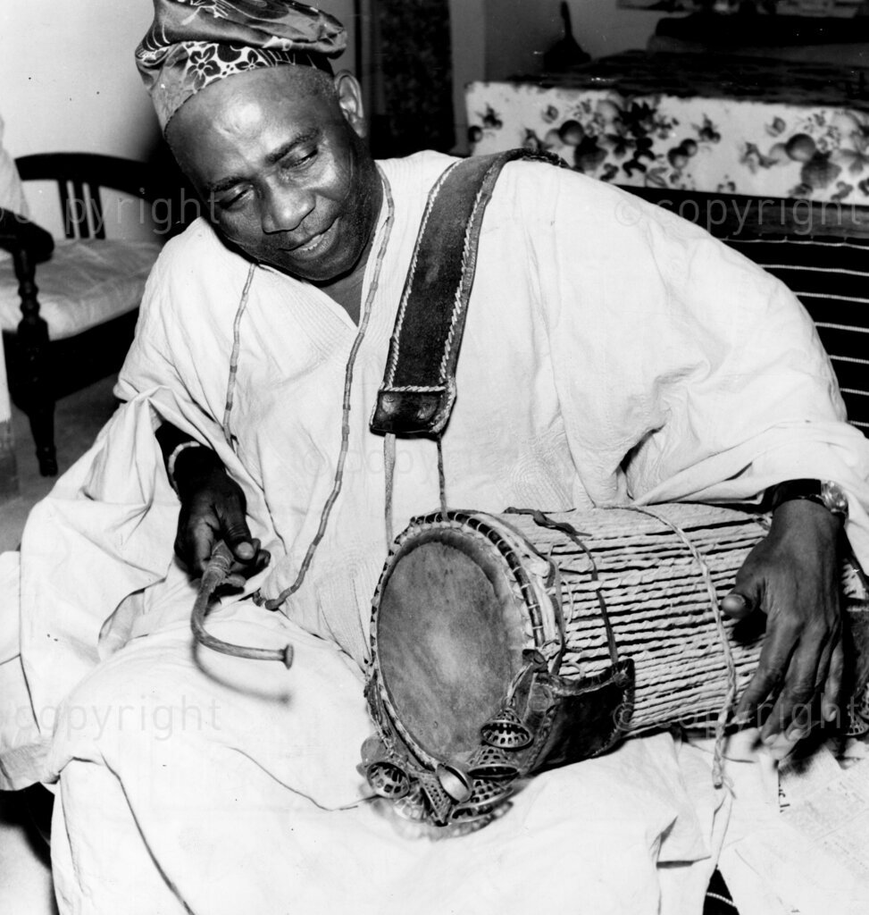 In all Western Nigeria we find this jolly sportsman is the happiest Oba. He spells life in three letters; fun. That's the Oba of Ede in Western Nigeria. He actually works at pleasure like some people work at their jobs. Says it's the reason why he is a young old man. How he summons his attendants, The Oba with his 