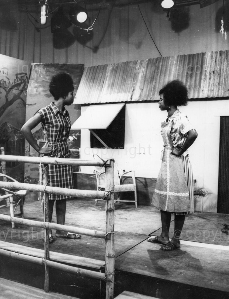 Spotlight on the theatre; Nigerian girl Turrie on the right at stage 