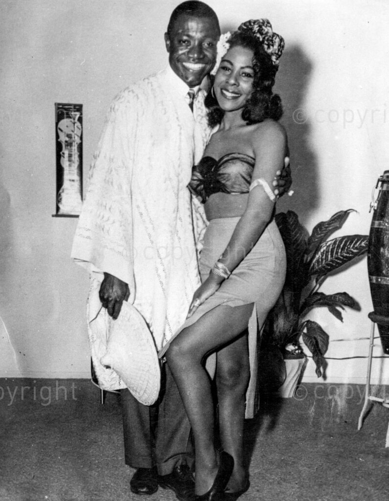 Here's Nigeria's greatest showman; Anyaogu Elekwachi Ukonu, Nigeria's actor. Ukonu embraces a partner after a hot number. He can make you laugh yourself sick and he can also make you feel sweetly sorrowful. His ambition, he says, is to make people forget their problems and blues. Anyaogu Elekwashi Ukonu is an uninhibited showman. You never can tell what he will be up to next.