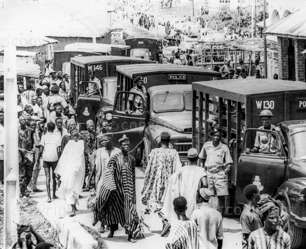 Despite the fear and the threats, Okpara triumphs In No-Man's Land. Lorry loads of police accompanied Dr Okpara in West. But tour that made people fear worst caused no incidents, and police had little to do but clear way through happy crowds. Dr Michael Okpara's meet-the-people-tour of Western Nigeria, apart from proving a bizarre mixture of incivility, escapism, hefty defence against non-existent troubles and a field day for journalistic zanies and radio cranks, was a glorious personal triumph for Dr Okpara's bravery and a confirmation that the people of Western Nigeria have not forgotten Chief Abafemi Awolowo and can still welcome any leader who comes along as his friend.