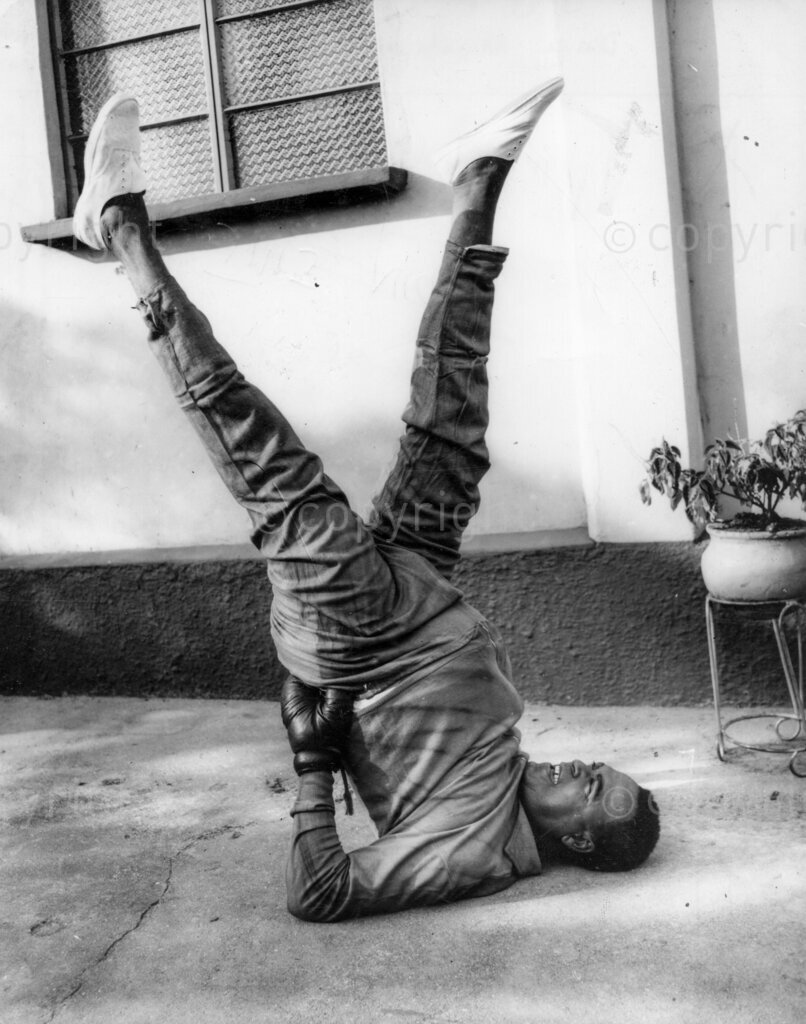 JMJ puts his feet up. Chief Johnson Joseph Modupe keeps fit at home. At 52 he is in fine fettle. At the summit of his success, Chief JM Johnson walked out of politics. Why did the charming and much loved JMJ, Nigeria's erstwhile Federal Minister of Labour, decide not to seek re-election to the supreme legislature of his country?