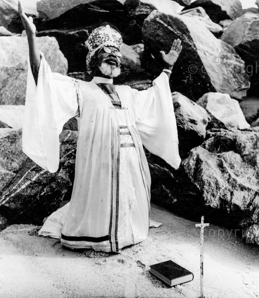 A prophet's vision of doom – Nigerian Prophet Aladura. The prophet, in his brilliant robes, goes to the Atlantic at Victoria Beach, Lagos, to 