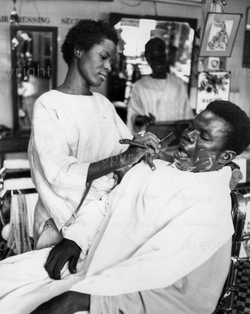 Nigerian women barbers.