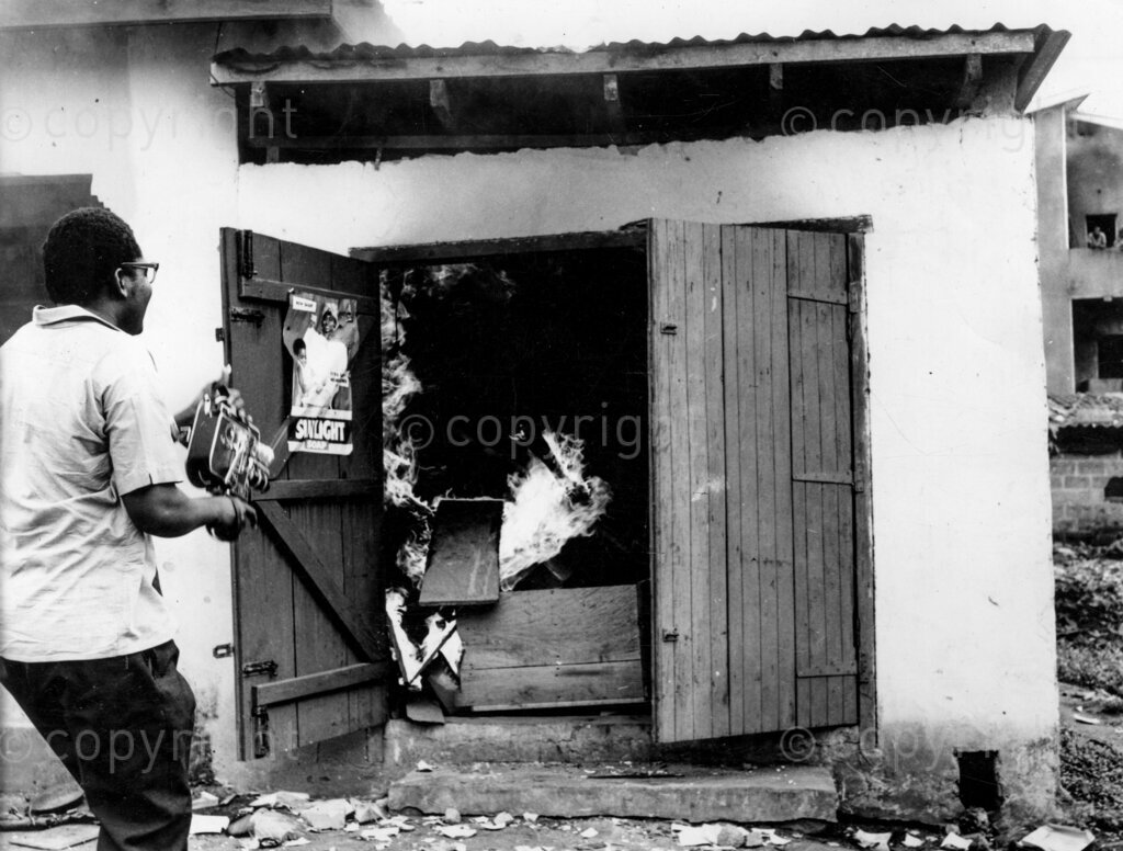 The Motive For Massacre – A newsreel cameraman photographs a house set alight by party thugs. 107 murders, nearly 700 innocent people were wounded, more than 180 homes were burnt down, and property worth millions destroyed.