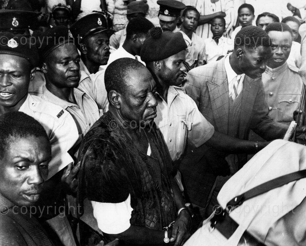Jack the ripper of Abakaliki; lhe late Chief Obodo is led to court fo face charges of murder. Six feet of terror, six feet of bluster and swashbuckling. It was said he sent hundreds of people to their final resting place. But, like all tough guys, he went too far, put his own neck in a noose. And a big sigh of relief swept Abakaliki. It was a face feared by the people, but now it holds no threat.