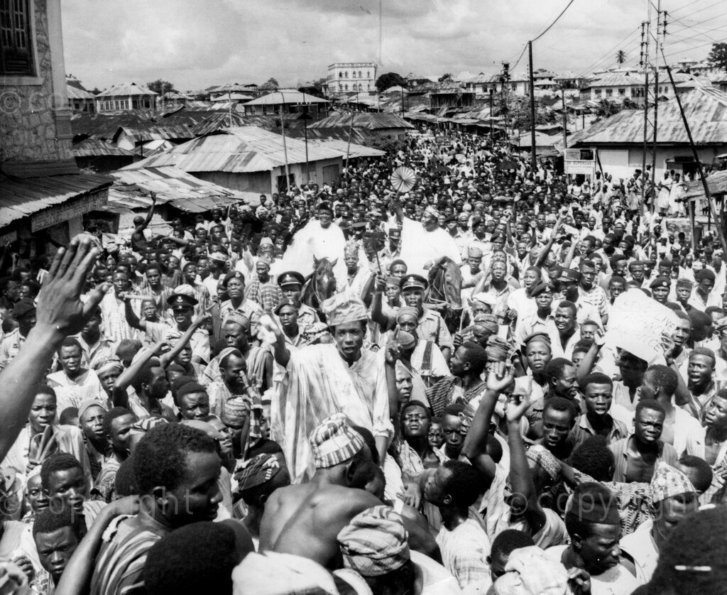 Despite the fear and the threats, Okpara triumphs In No-Man's Land. Dr Michael Okpara's meet-the-people-tour of Western Nigeria, apart from proving a bizarre mixture of incivility, escapism, hefty defence against non-existent troubles and a field day for journalistic zanies and radio cranks, was a glorious personal triumph for Dr Okpara's bravery and a confirmation that the people of Western Nigeria have not forgotten Chief Abafemi Awolowo and can still welcome any leader who comes along as his friend.