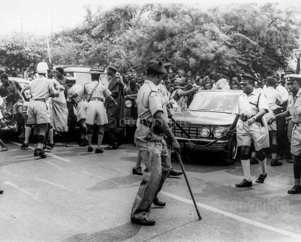 Despite the fear and the threats, Okpara triumphs In No-Man's Land. Okpara snaps the huge crowds. Dr Michael Okpara's meet-the-people-tour of Western Nigeria, apart from proving a bizarre mixture of incivility, escapism, hefty defence against non-existent troubles and a field day for journalistic zanies and radio cranks, was a glorious personal triumph for Dr Okpara's bravery and a confirmation that the people of Western Nigeria have not forgotten Chief Abafemi Awolowo and can still welcome any leader who comes along as his friend.