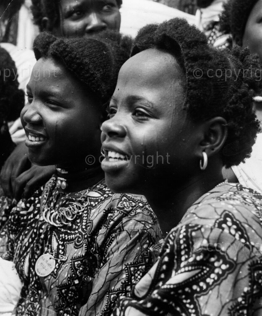 The women of the North. The face of Northern Beauty, keen-eyed, eager, smiling. They have discovered an exciting new world, a world in which a woman is no more a mere chattel, a carrier of wood. It is a world of occasional flirting, of dancing, of having a say in whom they should marry and whom they should not. No wonder they look so eagerly towards the future!