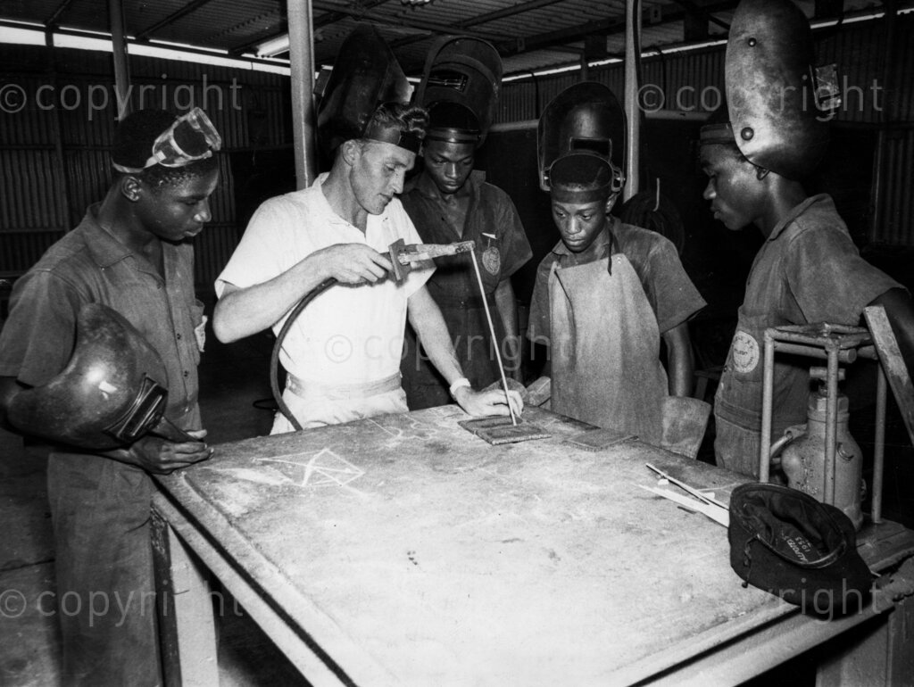 Oil In Nigeria. How oil was found. Nigerian students at the Port Harcourt Training School at work in the welding workshop. The discovery of oil in Nigeria has marked the beginning of a new and vital era in the development of the country. It has opened up vast economic vistas, paths to prosperity along which all may one day tread. The search has been a long and costly one. It has demanded enterprise and capital, daring and foresight. These have not been lacking, and from swamp and jungle the liquid gold that is oil now spurts triumphantly forth. Shell-BP began search for the oil in Nigeria in 1937.