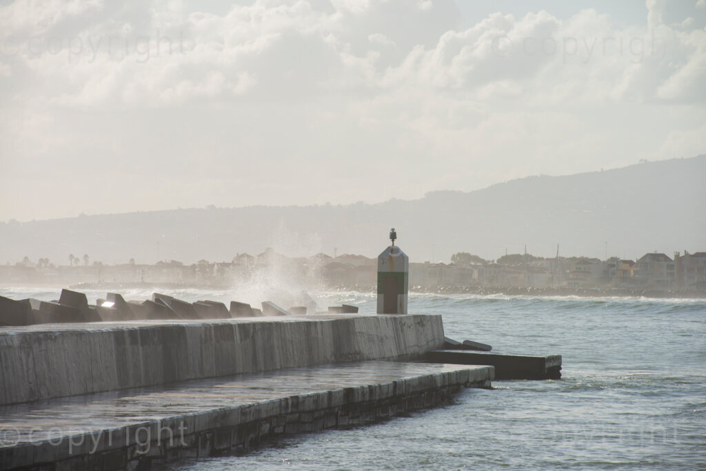 Surfers enjoyed the unusually high waves in Gordon's Bay, in the Western Cape, Tuesday afternoon, July 14, 2020, after gale force winds and flash floods had beaten the coast for several days. PHOTO: EVA-LOTTA JANSSON 