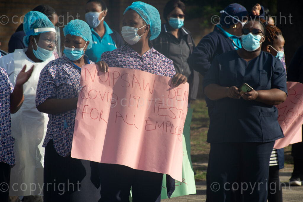 Hospital workers demonstrate outside Tygerberg Hospital, in Cape Town, to bring their plight to the attention of President Cyril Ramaphosa, as he visited the Cape Town Province. PHOTO: EVA-LOTTA JANSSON