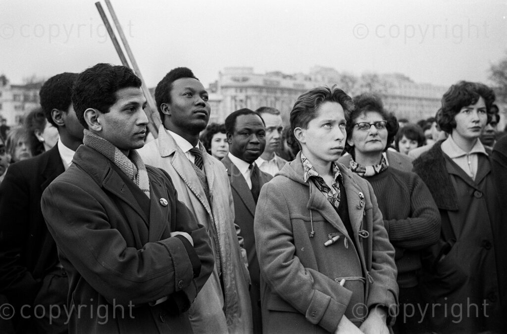 Dr Verwoerd's Commonwealth Walk-Out Was The United Front's Biggest Victory – How they got busy. United Front members lead a big march along London's Oxford Street at the time of the Prime Ministers' Conference. In front from left Oliver Tambo, Kusen Guizi, Dr Y Dadoo, Fenner Brockway Labour MP, and Nana Mahoma. Dr Verwoerd had just arrived and delivered a 'No Interference with our Policies' speech. Dr Verwoerd's walk-out from the commonwealth is a severe set back to the whole business and financial structure of the Union. Its political consequences must be tremendous, and will be felt increasingly, year after year. To one group it represents a signal victory, the South African politicians in exile known as 'the United Fronts.'