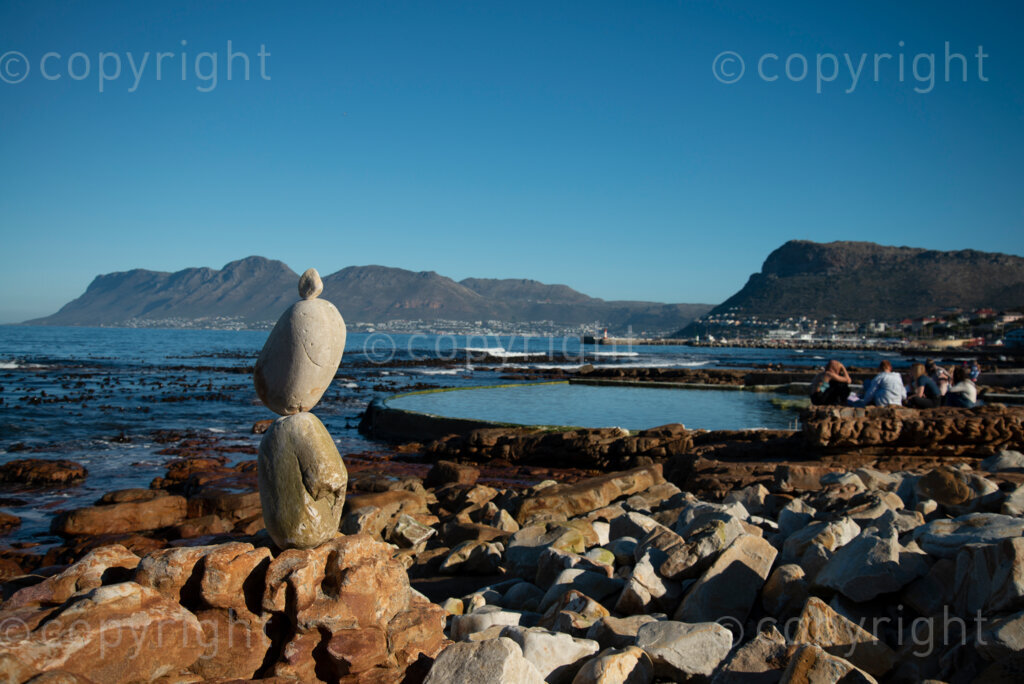 Sipho Njengezi balances rocks in Kalk Bay, Cape Town, on Thursday afternoon, July 17, 2020. PHOTO: EVA-LOTTA JANSSON 