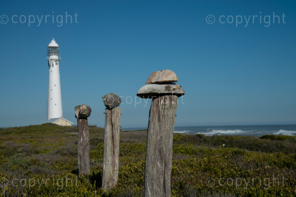 Stones stacked on top of an old fence near Slangkop light house in Kommetjie, Cape Town, Thursday, July 17, 2020. PHOTO: EVA-LOTTA JANSSON 