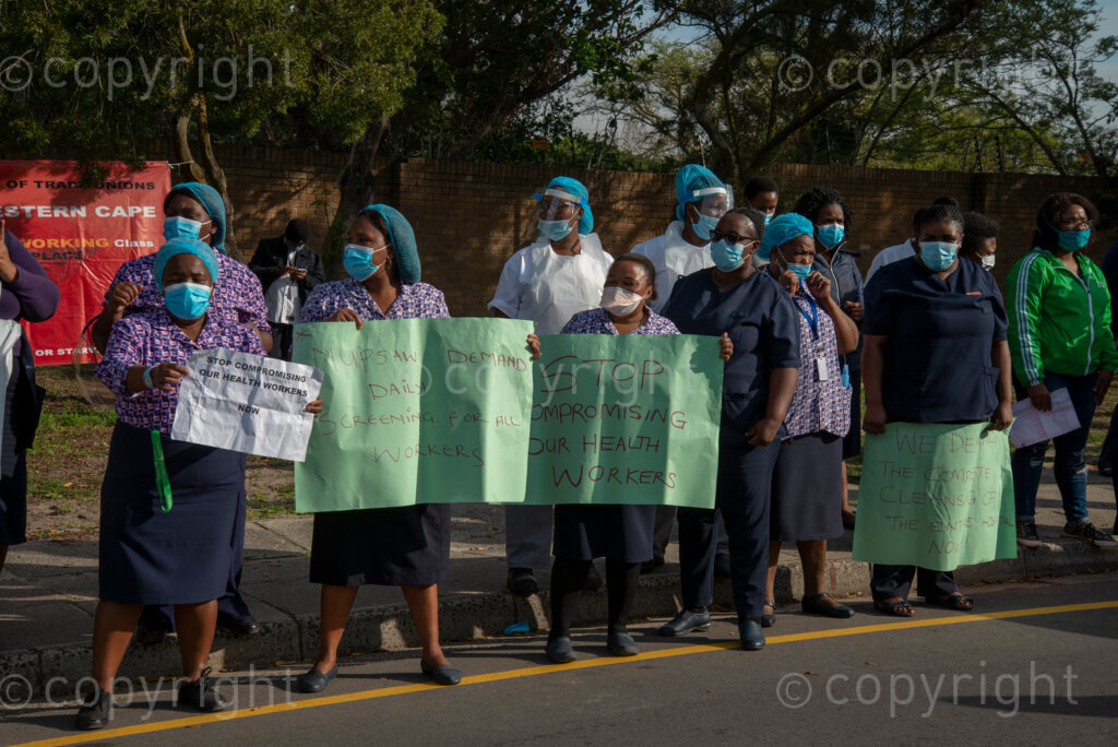 Hospital workers demonstrate outside Tygerberg Hospital, in Cape Town, to bring their plight to the attention of President Cyril Ramaphosa, as he visited the Cape Town Province. PHOTO: EVA-LOTTA JANSSON
