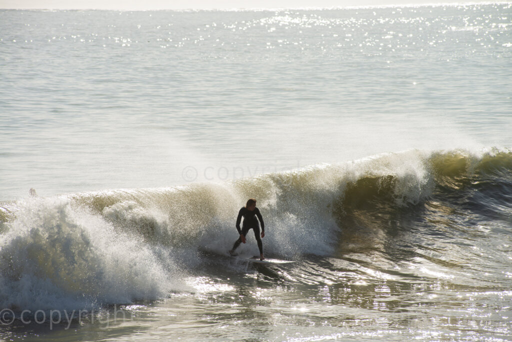 Surfers enjoyed the unusually high waves in Gordon's Bay, in the Western Cape, Tuesday afternoon, July 14, 2020, after gale force winds and flash floods had beaten the coast for several days. PHOTO: EVA-LOTTA JANSSON 