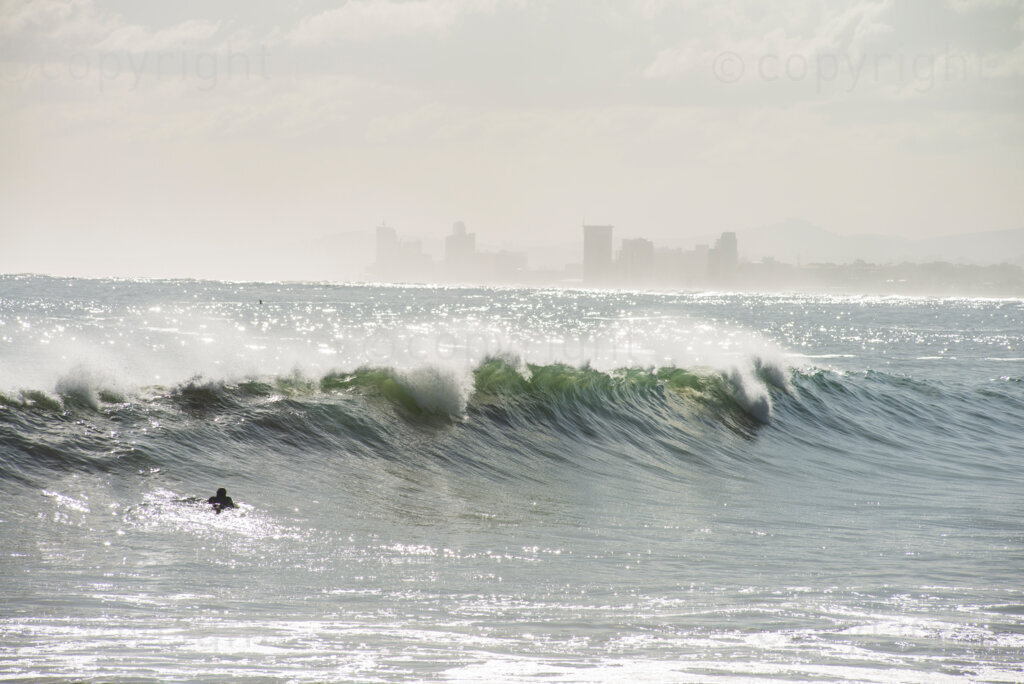 Surfers enjoyed the unusually high waves in Gordon's Bay, in the Western Cape, Tuesday afternoon, July 14, 2020, after gale force winds and flash floods had beaten the coast for several days. PHOTO: EVA-LOTTA JANSSON 