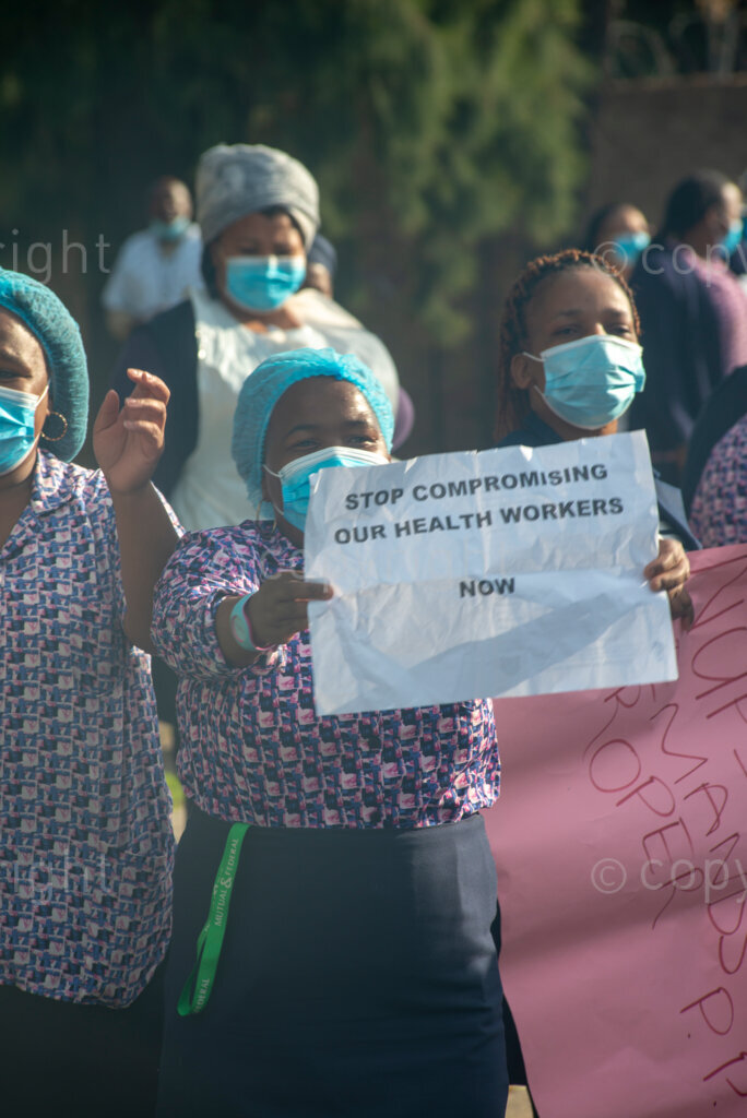 Hospital workers demonstrate outside Tygerberg Hospital, in Cape Town, to bring their plight to the attention of President Cyril Ramaphosa, as he visited the Cape Town Province. PHOTO: EVA-LOTTA JANSSON