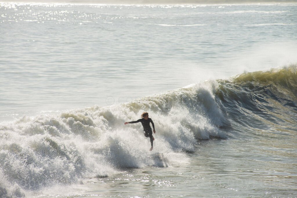 Surfers enjoyed the unusually high waves in Gordon's Bay, in the Western Cape, Tuesday afternoon, July 14, 2020, after gale force winds and flash floods had beaten the coast for several days. PHOTO: EVA-LOTTA JANSSON 