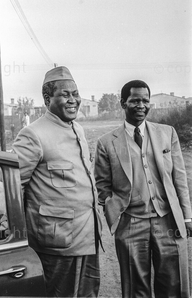 Banned Chief Luthuli, shut on his farm, says that there's Freedom In The Air – Chief Luthuli and Oliver Tambo at Johannesburg Station, before his banning in May 1959. There were more policemen waiting for him at Germiston, where Luthuli climbed out to greet his friend Oliver Tambo. They followed him to Tambo's house, where Luthuli slept. Next day was Saturday, the day for Luthuli to come to Johannesburg. More police at Germiston station. More police and a thousand people waiting on the platform at Johannesburg. These people were not there as an organised greeting. They had come by chance in case Luthuli arrived.