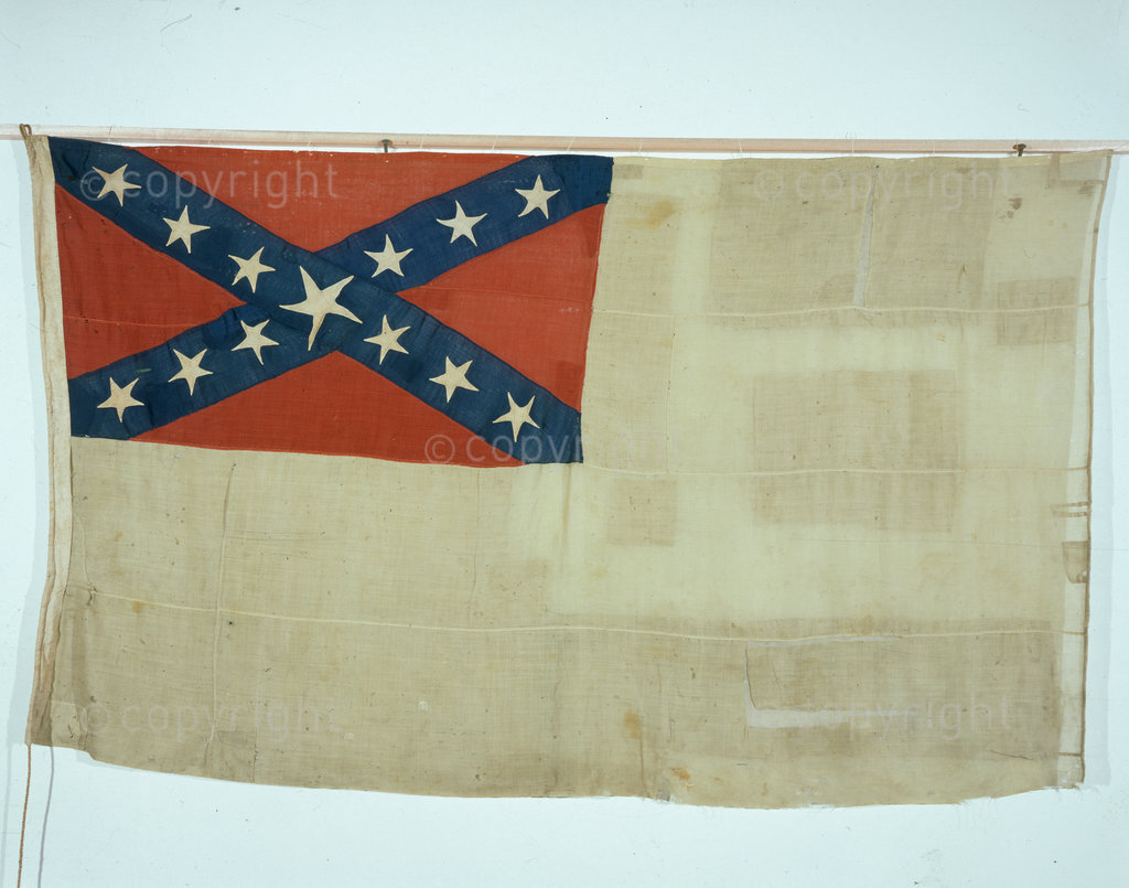 This is the flag of the Confederate States of America, given by Captain Semmes of the commerce raider CSS Alabama to  William Anderson, of Andersons Ship Chandlers, in Simons Town. It was presented to the South African Museum in the 1930s by  William Runciman.The Alabama was one of the most famous ships in the American Civil War, inflicting considerable damage on the sea-trade of the United States by sinking 62 ships and capturing many others. It entered Table Bay on August 5 1863, having captured the 'Yankee' vessel Sea Bride within sight of Cape Town, and is immortalised in a folk song: 'Daar kom die Alabama (Here comes the Alabama) ...'.Iziko Social History Collections: SACHM 6574 Photo: Pam Warne
